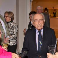 Kate Pew Wolters, Seymour Padnos, and Philly Mantella talking.